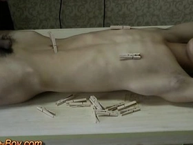 Slim asian slave boy got pain clips