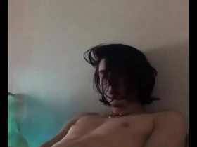 Teen boy playing on webcam