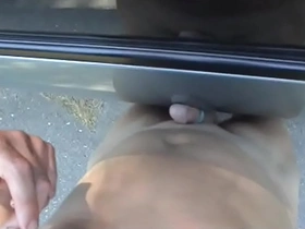 Cumming on top of a car